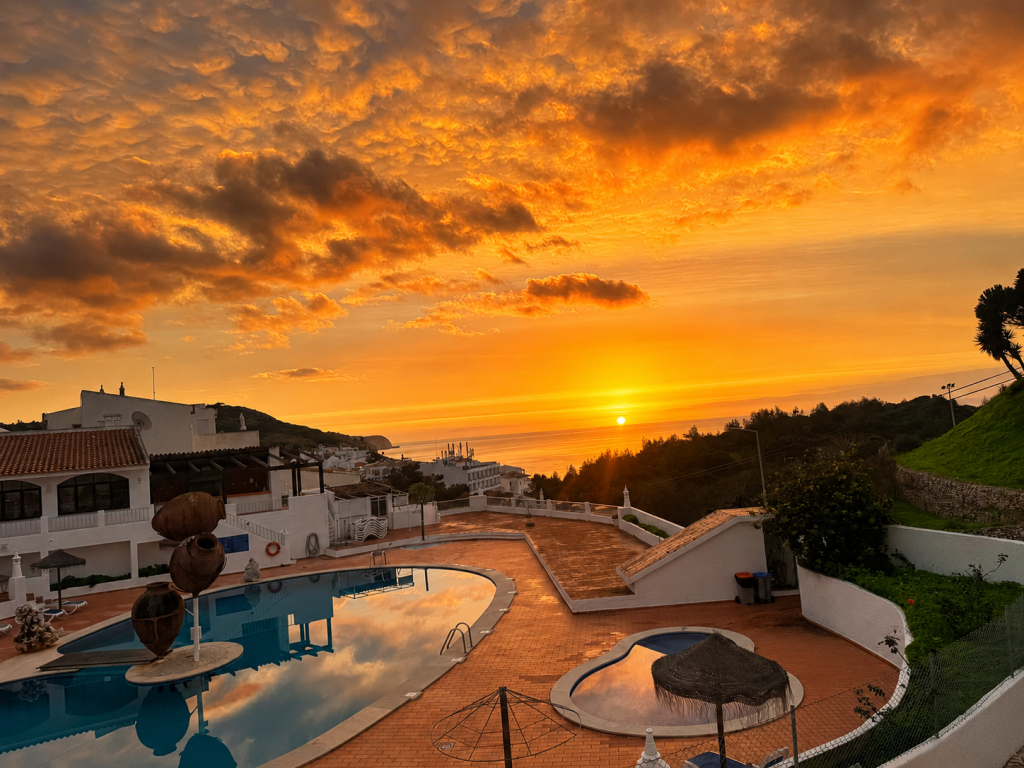 sunset at salema praia clube in the algarve